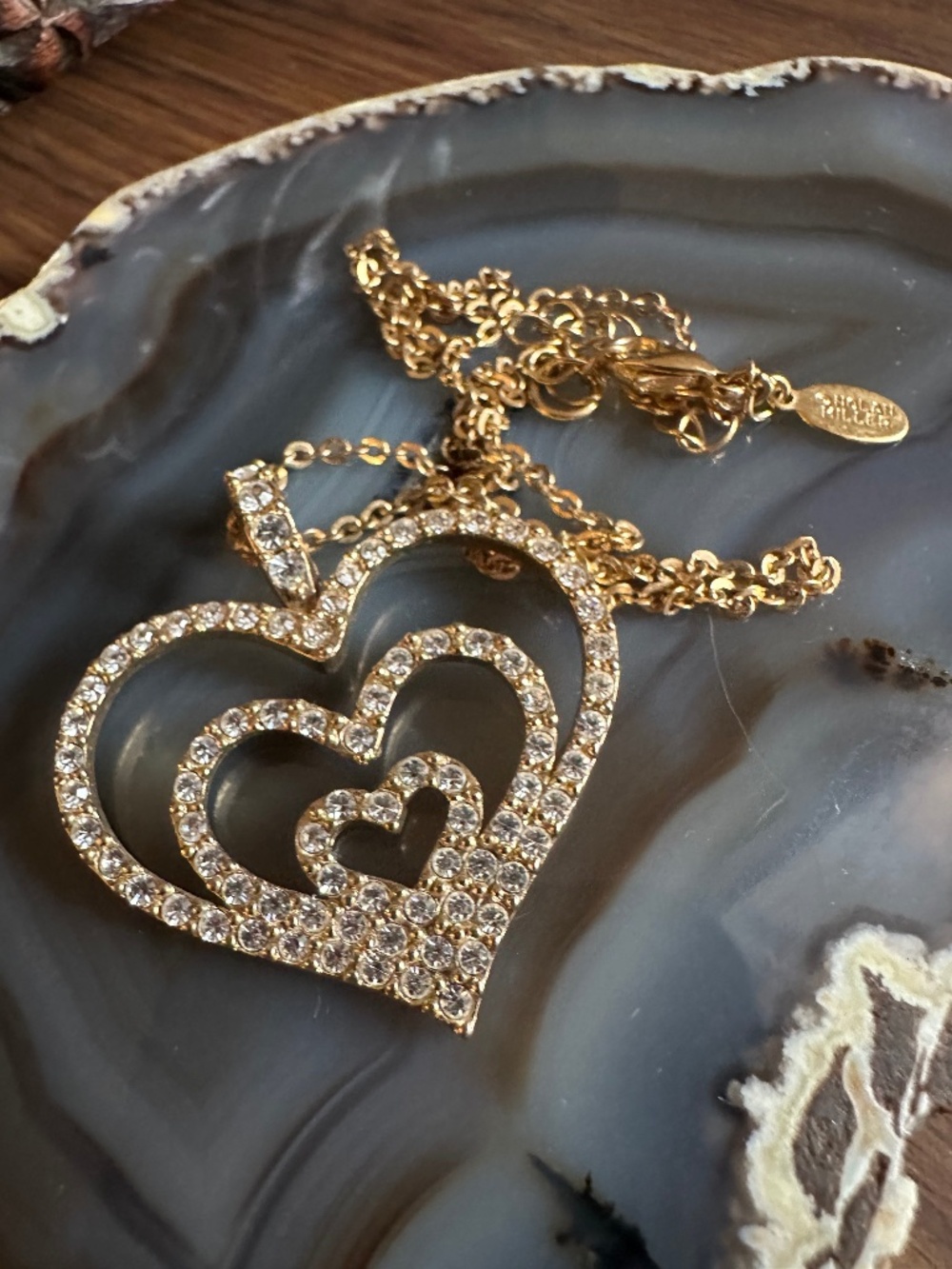 Nolan Miller triple heart love necklace